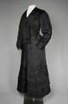 Suit, black ottoman silk trimmed with Maltese crosses and tassels of silk-wrapped beads, 1915-1917, side view by Irma G. Bowen Historic Clothing Collection