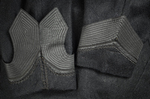 Jacket, black wool with large scalloped revers, pouched front, and topstitched silk trim, c. 1902, detail of back and front of cuffs by Irma G. Bowen Historic Clothing Collection