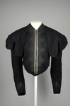 Jacket, black wool with large scalloped revers, pouched front, and topstitched silk trim, c. 1902, front view