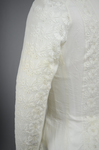 Shirtwaist, white embroidered cotton with ruffles flanking the buttoned front, 1884, detail of sleeve by Irma G. Bowen Historic Clothing Collection