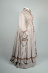 Housedress, cotton printed with a brown geometric pattern, separate underskirt, c. 1875, side view by Irma G. Bowen Historic Clothing Collection