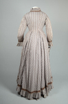 Housedress, cotton printed with a brown geometric pattern, separate underskirt, c. 1875, back view by Irma G. Bowen Historic Clothing Collection