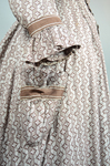 Housedress, cotton printed with a brown geometric pattern, separate underskirt, c. 1875, detail of cuff and pocket by Irma G. Bowen Historic Clothing Collection