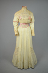 Dress, cream wool trimmed with lace, pink velvet, and multi-colored machine embroidery, 1908, front view by Irma G. Bowen Historic Clothing Collection