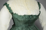 Dress, green damask silk with integral Swiss waist over a cotton blouse, 1860-1863, detail of bodice
