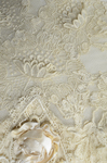 Dress, House of Rouff, cream wool with lace-draped bodice and sleeves, trimmed with cording, ribbon fronds, and roses, c. 1905, detail of bodice tambour lace