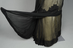 Dress, House of Worth, black silk chiffon and cream silk satin with cream lace, 1910-1915, detail beneath the skirt drape in back by Irma G. Bowen Historic Clothing Collection