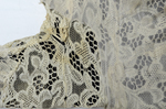 Dress, House of Worth, black silk chiffon and cream silk satin with cream lace, 1910-1915, detail of underside of pieced lace by Irma G. Bowen Historic Clothing Collection