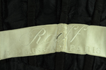 Evening gown, House of Rouff, black silk taffeta and satin with layered black net overlays embroidered with elongated black spangles and round sequins, c. 1905, detail of label by Irma G. Bowen Historic Clothing Collection