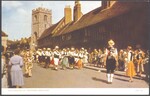 Dancers performing in the street in front of the Stratford-upon-Avon Guildhall