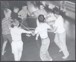 Young boys dance together at the Hanahau'oli school in Hawaii, 1963 by Unknown