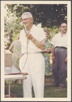 Leland Durkee holding microphone by Unknown