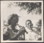 Emilie Jones and Bun McLain playing recorders by Unknown