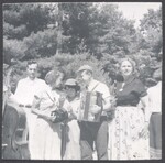 Outdoor group photograph of musicians by Unknown