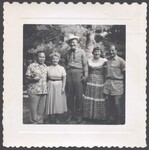 May Gadd and Ray Smith posing with three other unidentfied people