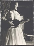 Jean Ritchie playing guitar