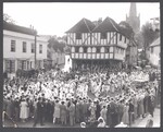 A large ensemble of Morris dancers and musicans performing together