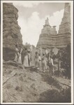 Eight dancers perform a salute to the rock formation "Queen Victoria" in Bryce Canyon, Utah, 1934