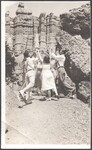 Dancers perform "Mage on a Cree" under the "Gulliver's Castle" rock formation in Bryce Canyon, Utah, 1934