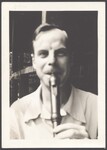 Close up on Phil Merrill playing the recorder