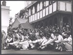 A large crowd, including Morris dancers, gathered under the Thaxted Guildhall