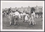 Couples performing a country dance