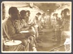 Black United States Army soldiers eating on train by Cobb, Ivorey, 1911-1992