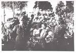 Elsie Margaret Stanton Cobb holding Gretel Anne Cobb and standing with unidentified soldiers, 1948 by Cobb, Ivorey, 1911-1992