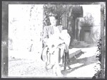 Elsie Margaret Stanton Cobb sitting in chair holding infant Gretel Anne Cobb, 1947 by Cobb, Ivorey, 1911-1992