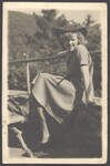 German woman sitting outside by Cobb, Ivorey, 1911-1992