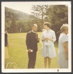 Bishop Charles Hall speaking with wedding guest, August 17,1970 by Unknown