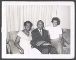 Ivorey and Elsie Cobb sitting with unidentified person, August 1, 1967 by Unknown