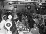 Butcher shop counter in market by Unknown