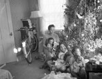 Elsie Margaret Stanton Cobb with daughters Marilyn, Gretel and Louise on Christmas morning by Unknown