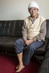 Bhutanese Man at Home, 2017 by Becky Field