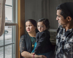 Bhutanese Family at a Window, 2014 by Becky Field