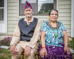 Bhutanese Couple in Their Yard, 2013 by Becky Field