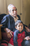 Bhutanese Man with Grandson, 2012 by Becky Field