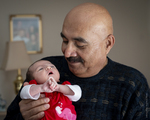 Afghan Grandfather and New Granddaughter, 2013 by Becky Field