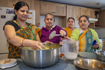 Bhutanese Women Making Food, 2013 by Becky Field