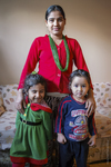 Bhutanese Mother and Children at Home, 2013 by Becky Field