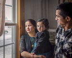 Bhutanese Family at a Window, 2014 by Becky Field