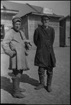 Two workers on a cobblestone street in Michurinsk, Russia, USSR, ca. 1932-1933 by Jacobi, Lotte, 1896-1990