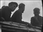 Workers leaning on construction material in Michurinsk, Russia, USSR, ca. 1932-1933 by Jacobi, Lotte, 1896-1990