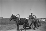 Wide shot of a man in a wagon pulled by a horse in Michurinsk, Russia, USSR, ca. 1932-1933 by Jacobi, Lotte, 1896-1990