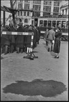 Helen Elliot photographing a group of people in line in Moscow, Russia, USSR, ca. 1932 by Jacobi, Lotte, 1896-1990