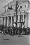 Helen Elliot photographing a group of people in line in Moscow, Russia, USSR, ca. 1932 by Jacobi, Lotte, 1896-1990