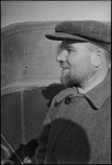 Profile of a Russian man in front of an automobile in Moscow, Russia, USSR, ca. 1932-1933 by Jacobi, Lotte, 1896-1990