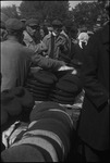 Man selling hats at a marketplace in Moscow, Russia, USSR, ca. 1932-1933 by Jacobi, Lotte, 1896-1990