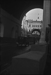 A street scene taken through an archway in Moscow, Russia, USSR, ca. 1932-1933 by Jacobi, Lotte, 1896-1990